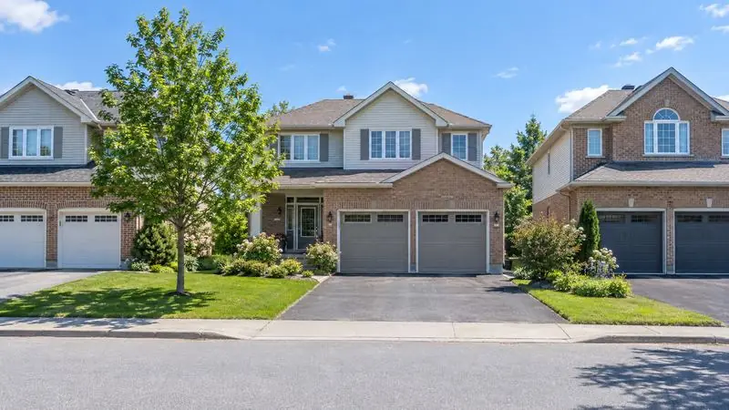 Homes with garage doors in Bridlewood, Ottawa