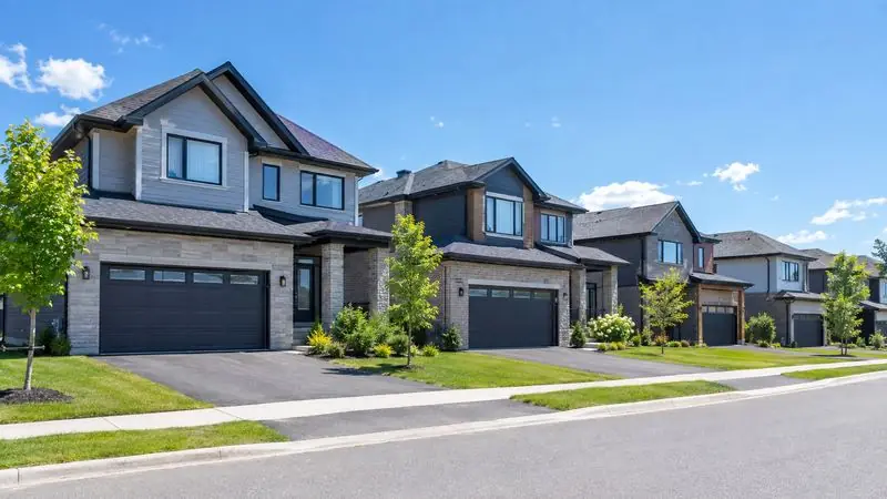 Homes with garage doors in Findlay Creek, Ottawa