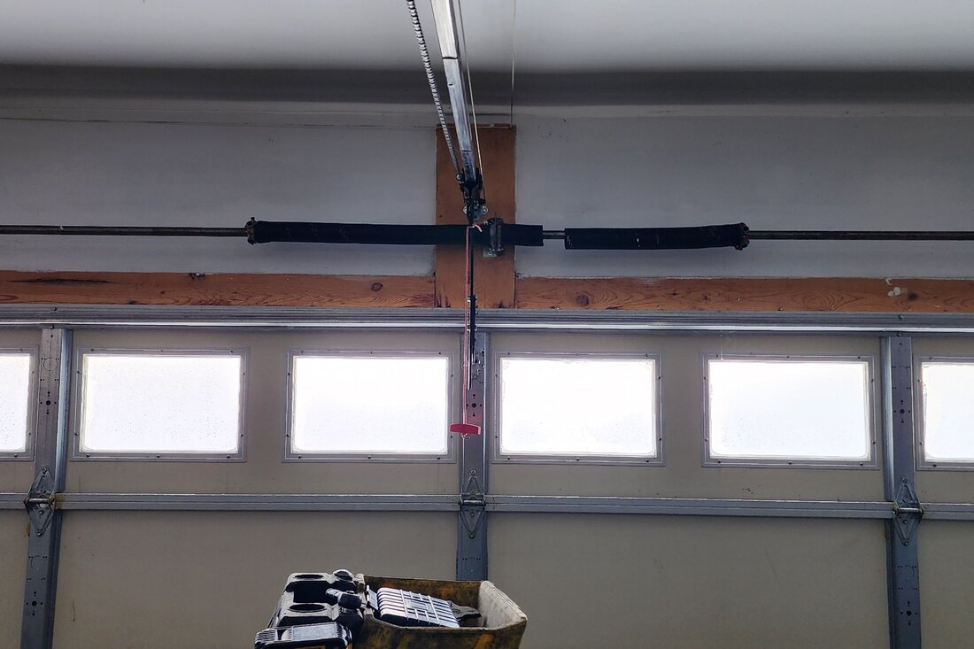 DPS Garage Doors newly installed dual torsion springs on a garage door in Ottawa