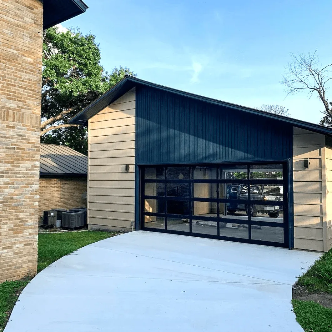 Contemporary aluminum and glass full-view garage door on a modern Ottawa home